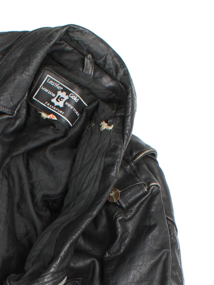 Vintage Beaded Leather Biker Jacket in a black colourway. Zip fastening, multiple pockets, motorcycle detailing and beaded detail on zippers.