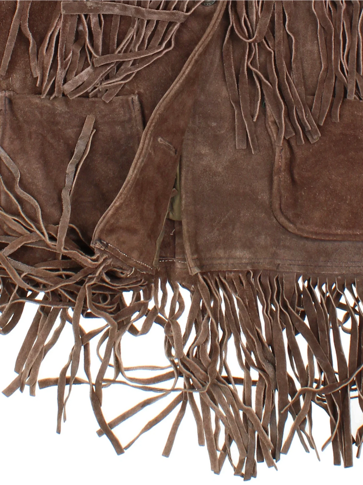 Vintage 70's Western Fringed Leather Jacket in a brown colourway. Button fastening, with front pockets and all over fringe detail.