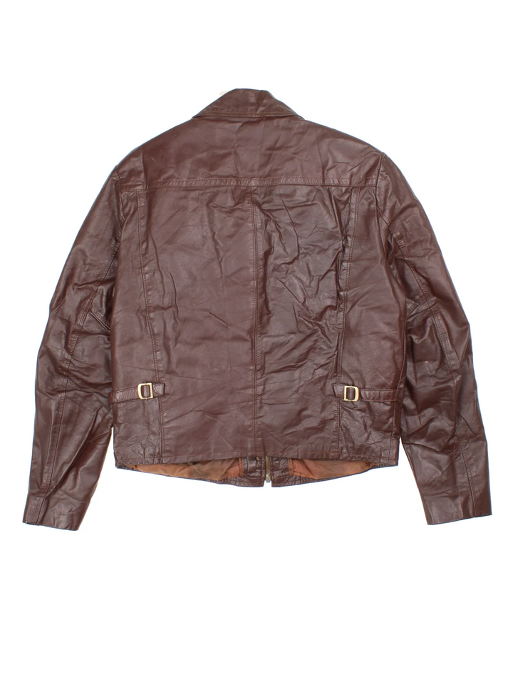 Vintage 70's Leather Bomber Jacket in a brown colourway. Zip fastening, with side pockets and detatchable fur lining.