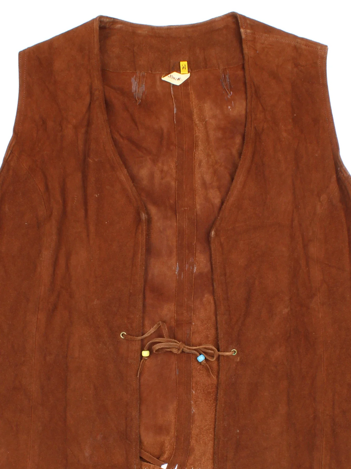 Vintage 70's Beaded Fringe Waistcoat in a tan colourway. Tie front fastening, with beaded and fringe detail.