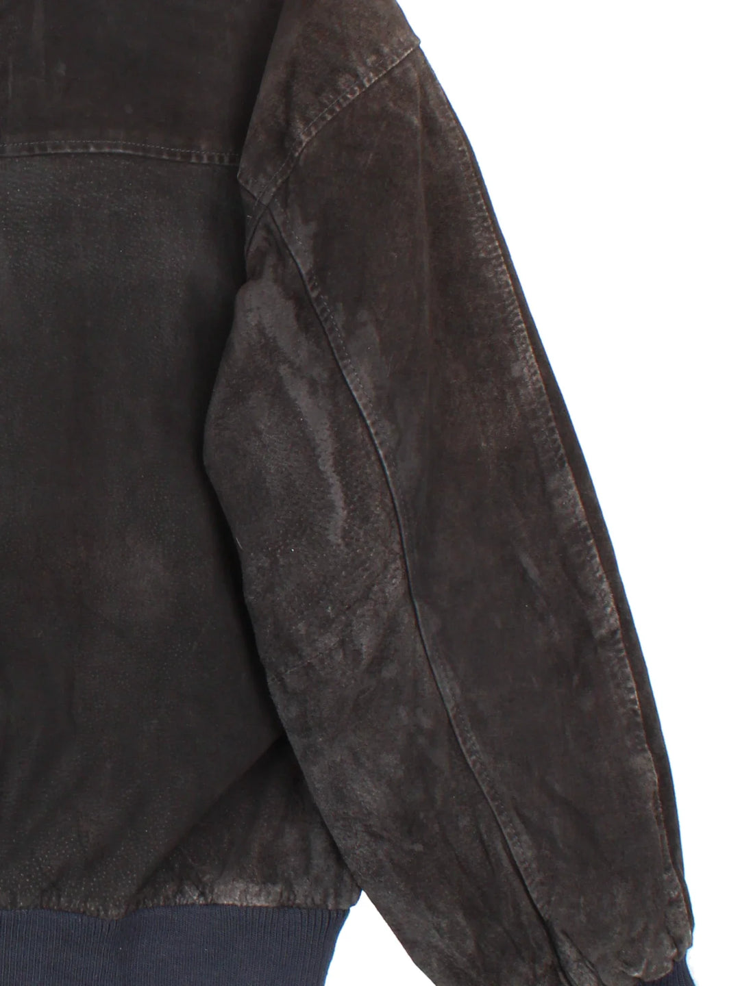 Vintage 90's Camel Suede Bomber Jacket in a black colourway. Buttons up and has side pockets, insulated with a satin lining, and has the logo embroidered on the front.