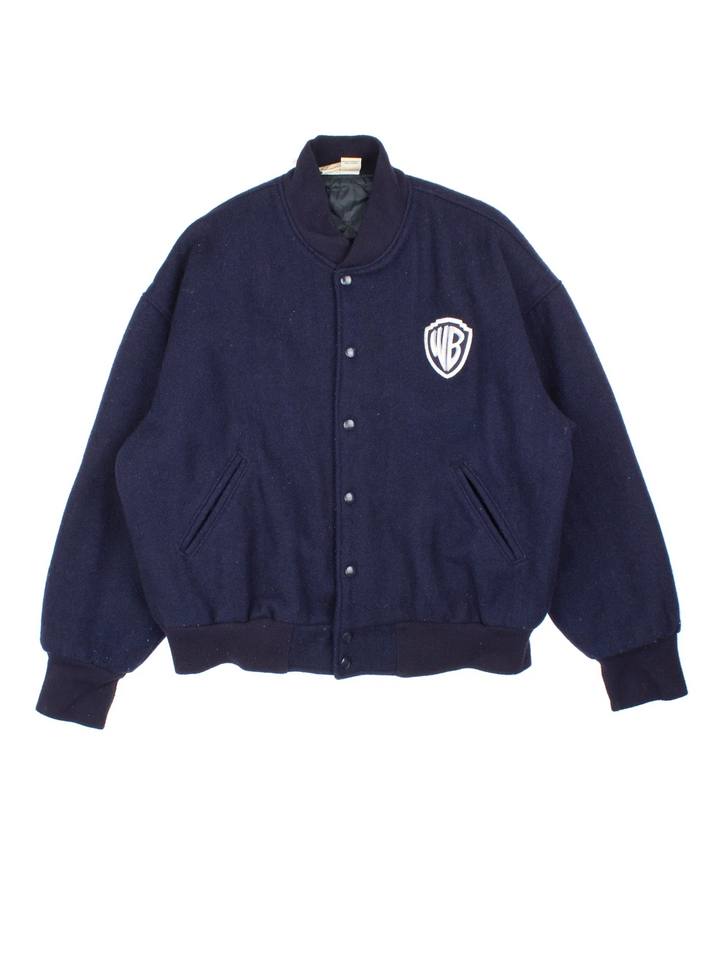 1998 Warner Bros Looney Tunes Woollen Varsity Jacket in a navy blue colourway. Buttons up and has side pockets, insulated with a quilted lining, and has the logo embroidered on the front and characters / spell out on the back.