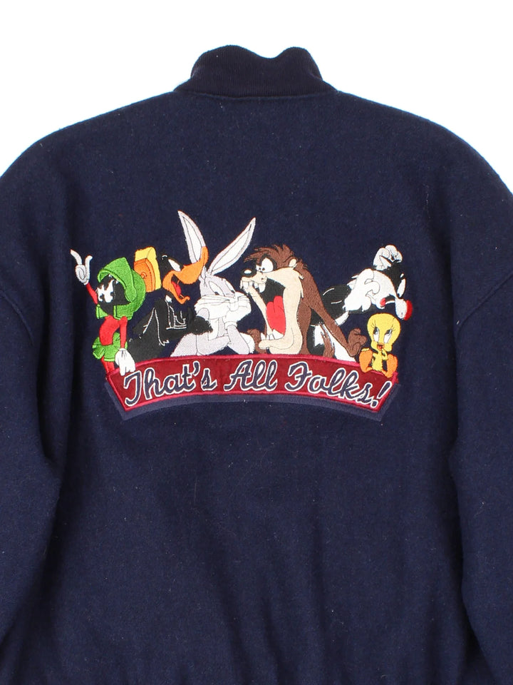 1998 Warner Bros Looney Tunes Woollen Varsity Jacket in a navy blue colourway. Buttons up and has side pockets, insulated with a quilted lining, and has the logo embroidered on the front and characters / spell out on the back.