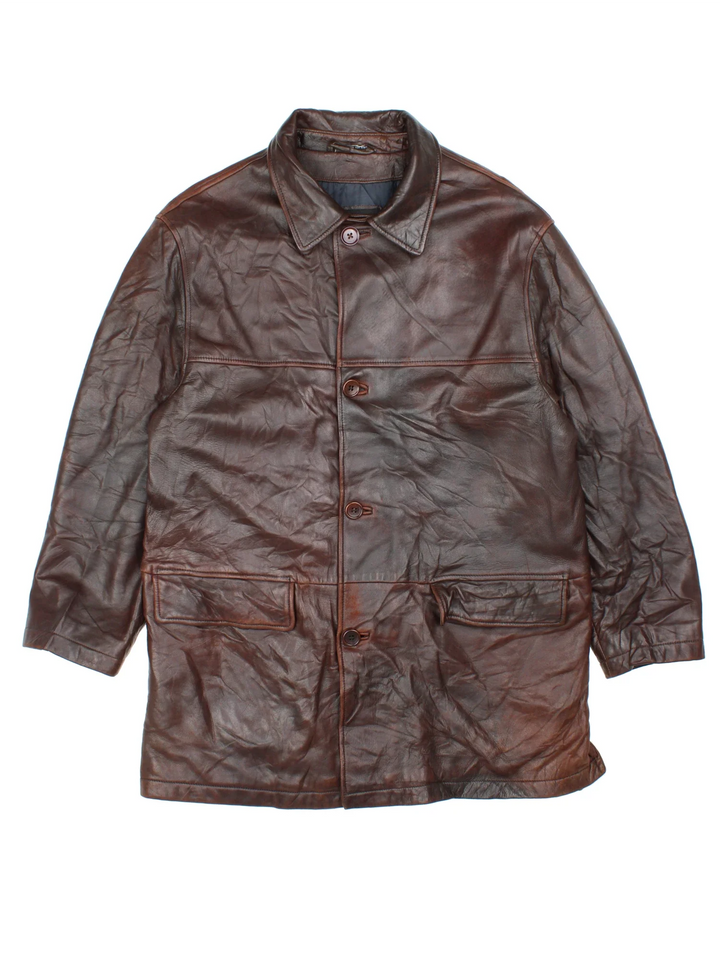 Vintage Hugo Boss Leather Coat in a brown colourway. Buttons up and has front pockets.