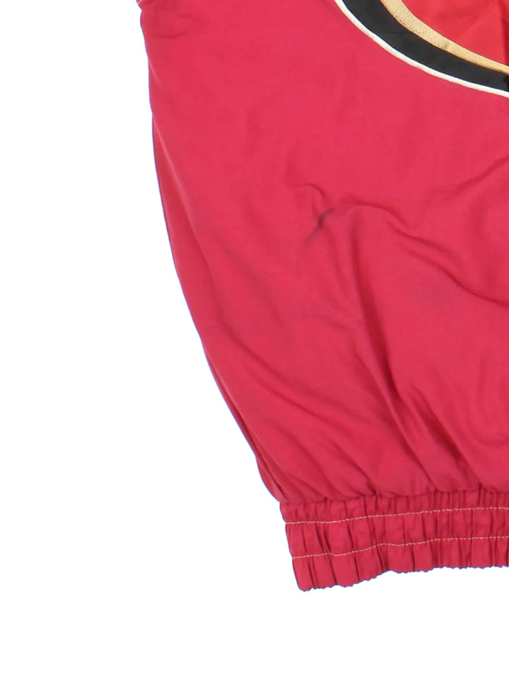90's San Francisco 49ers NFL Starter Jacket in a red colourway. Zip and button up closure, has multiple pockets, insulated lining, hooded, and has the team logo embroidered on the front and on the back.