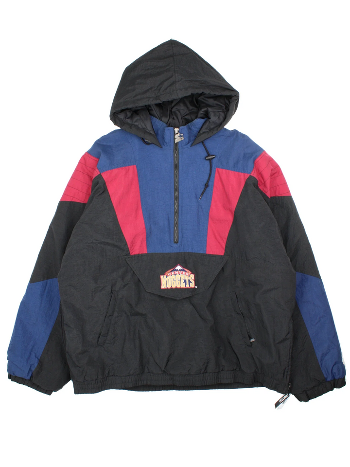 90's Denver Nuggets NBA Starter Jacket in a black colourway with blue and red panelling. Half zip up closure, has multiple pockets, insulated lining, and has the team logo embroidered on the front and back.