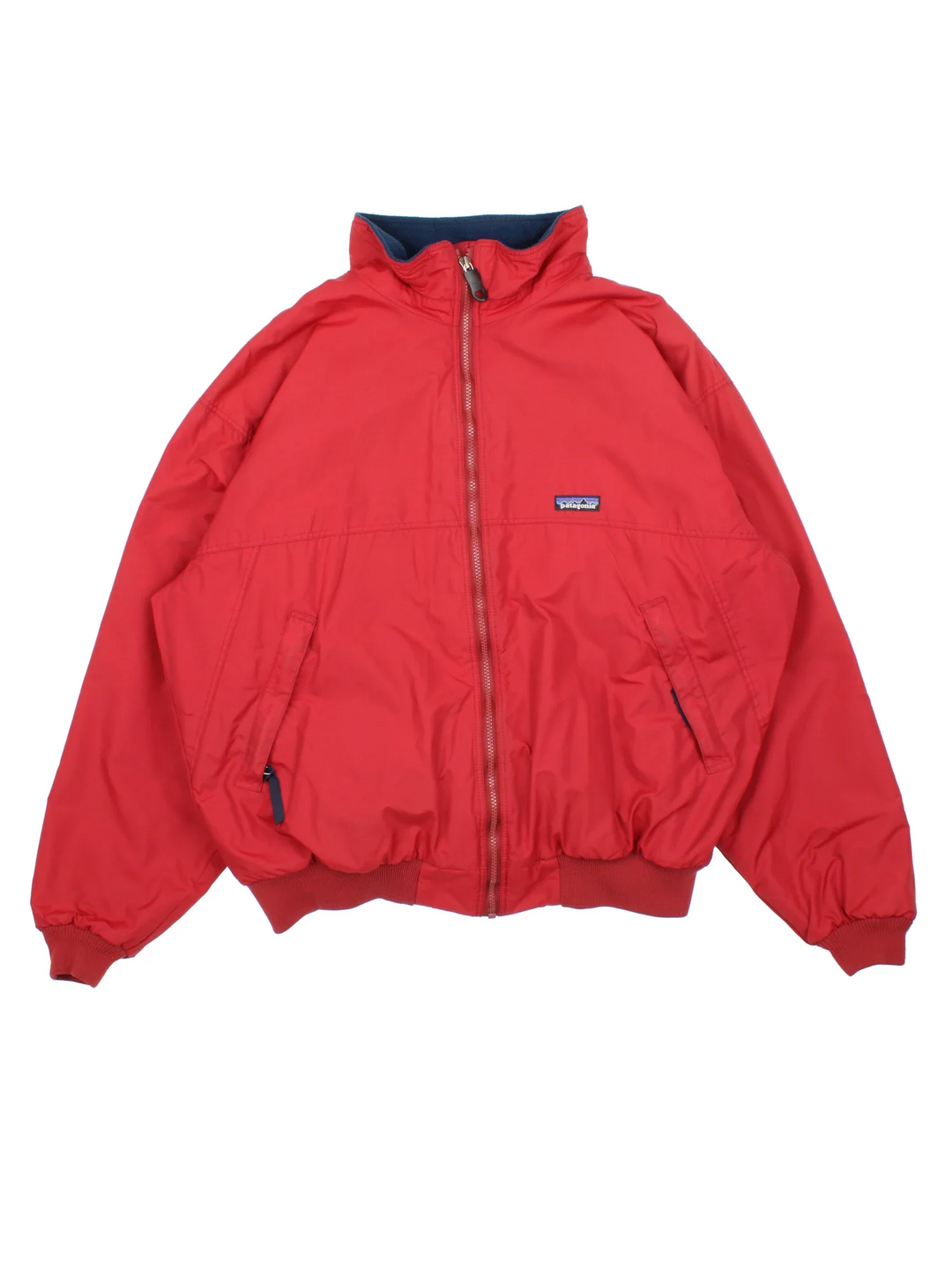 Vintage Patagonia Jacket in a red colourway. full zip up and has side pockets, fleece lining and small classic logo on the front.