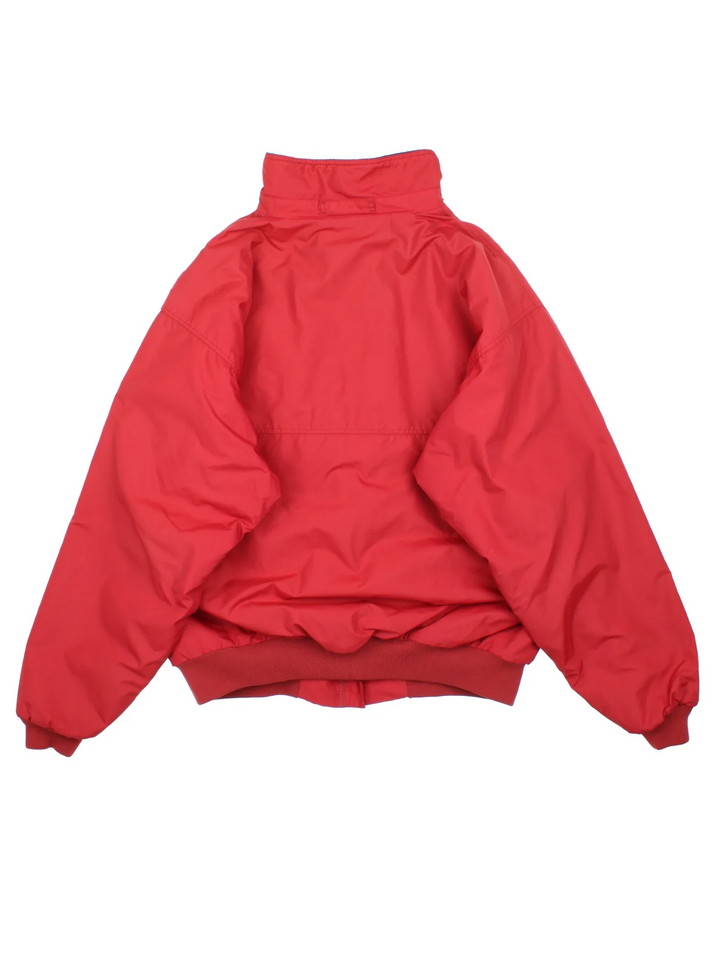 Vintage Patagonia Jacket in a red colourway. full zip up and has side pockets, fleece lining and small classic logo on the front.