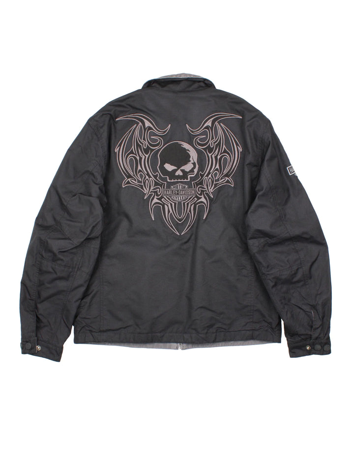 Harley-Davidson Jacket in a black colourway with grey revesible side. Full zip up, multiple pockets and large graphic on the back and brand logo.