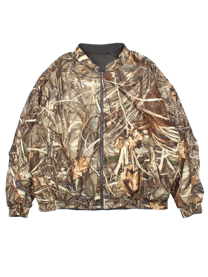 Vintage Real Tree Camo Reversible Bomber Jacket in a brown colourway with dark grey revesible side. Full zip up, multiple pockets and all over camo print on one side.