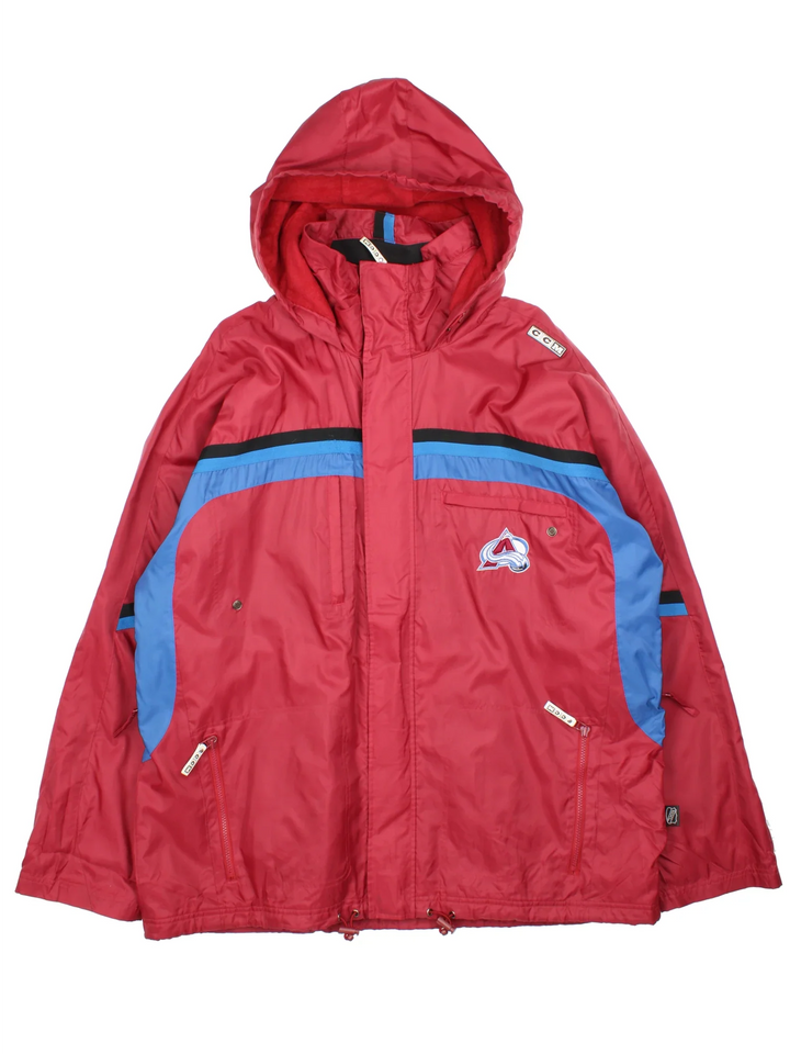 Colorado Avalanche NHL Jacket in a red colourway with blue and black panelling, Full zip up with multiple pockets, Drawstring hem and hood with large logo graphic across the back.