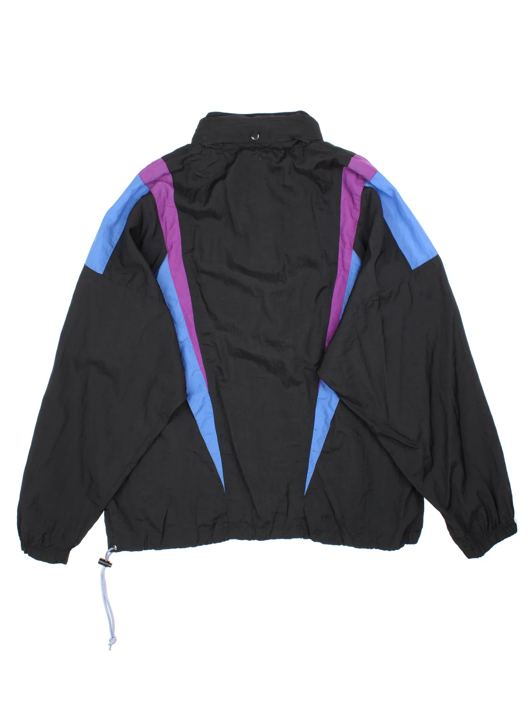 Vintage Reebok Tracksuit Jacket in a black colourway with blue and purple panelling, full zip up with multiple pockets and small logo on the chest.