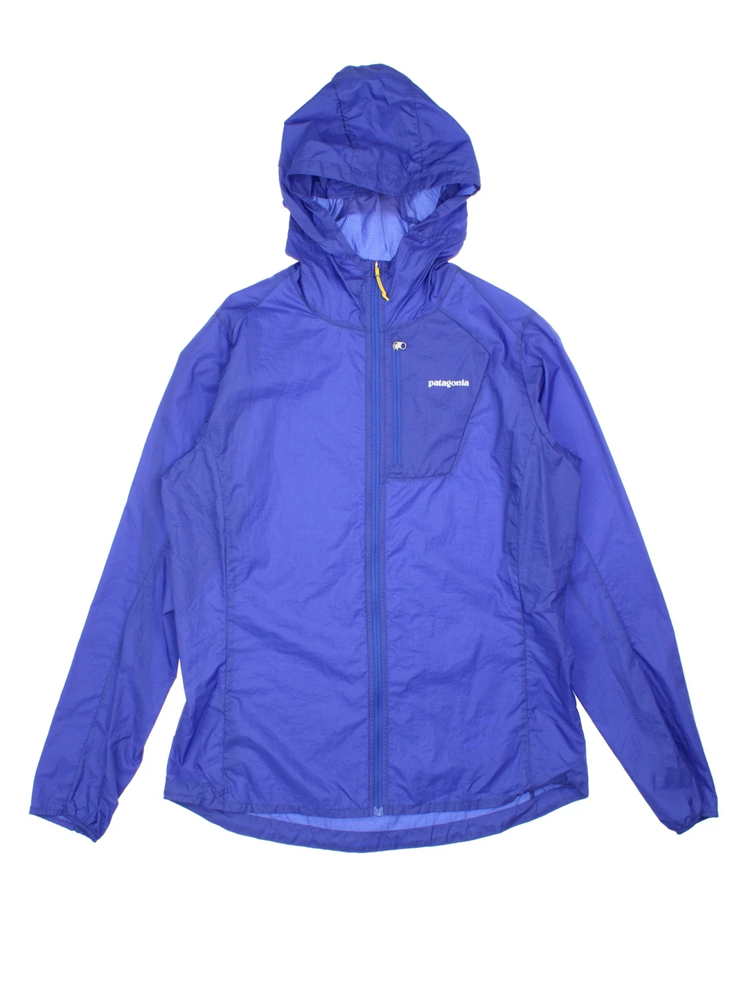 Patagonia Houdini Lightweight Jacket in a blue colourway with full zip up, small chest pocket, hood and small logo on the front.