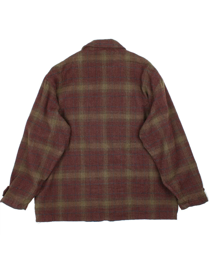 Ralph Lauren Chaps Woollen Flannel Jacket in a brown colourway with all over checked pattern. Full button up with wooden hardware and multiple pockets on the front.