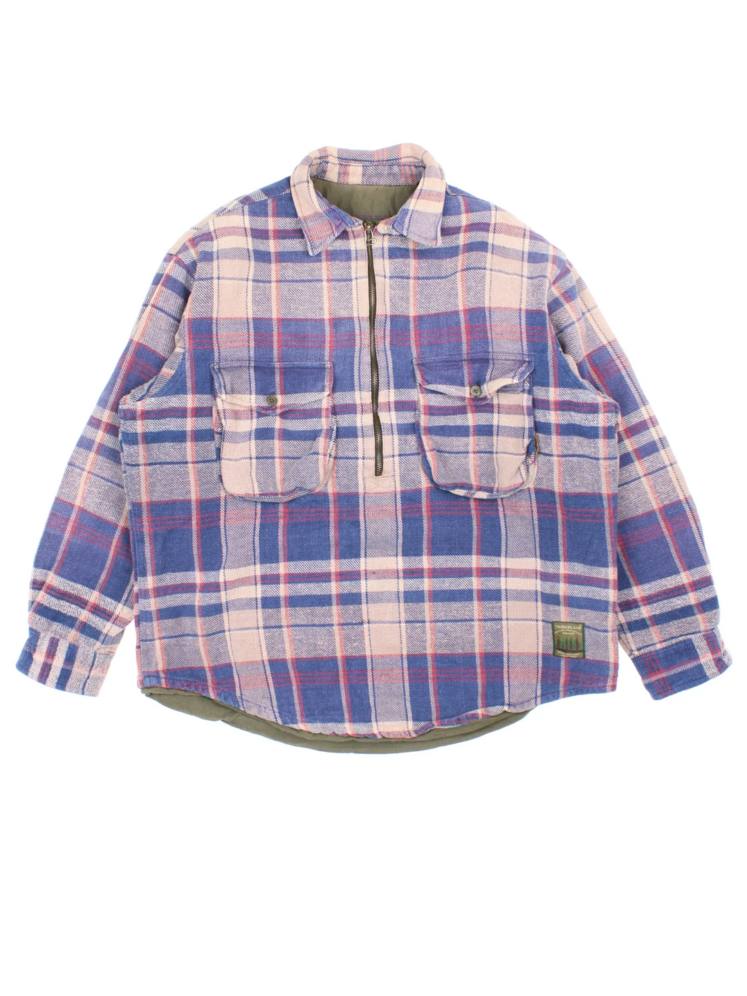 Timberland Plaid Pullover Shirt in a blue colourway with all over plaid pattern. Half zip up with double chest pockets on the front and patches on the elbows.