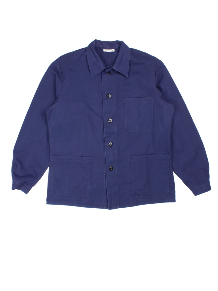 Vintage French Chore Work Jacket in a blue colourway. Buttons up and has multiple pockets.