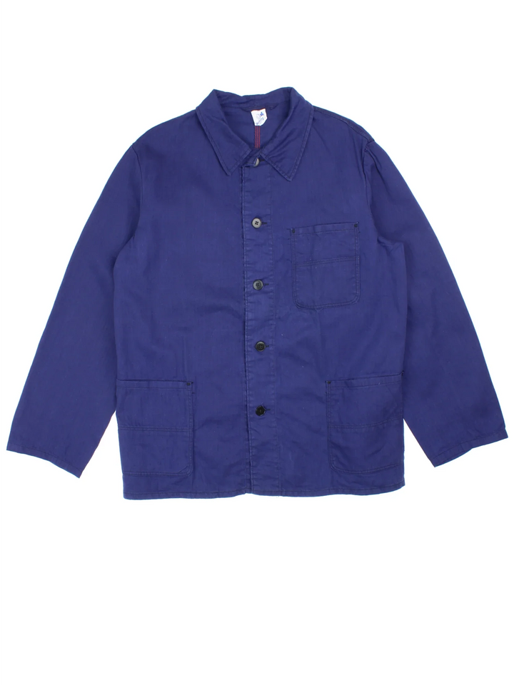 Vintage French Chore Work Jacket in a blue colourway. Buttons up and has multiple pockets.