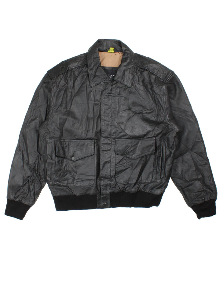 Vintage A-2 Leather Flight Jacket in a black colourway. Zips up and has multiple pockets.