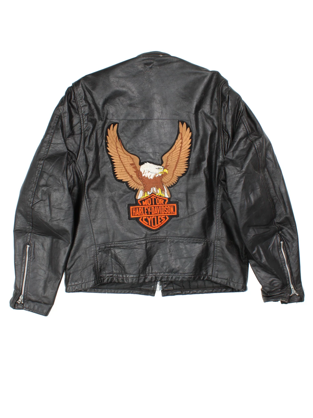 Vintage Leather Biker Jacket in a black colourway. Zips up and has side pockets, and custom Harley Davidson screamin eagle badge patch on the back.
