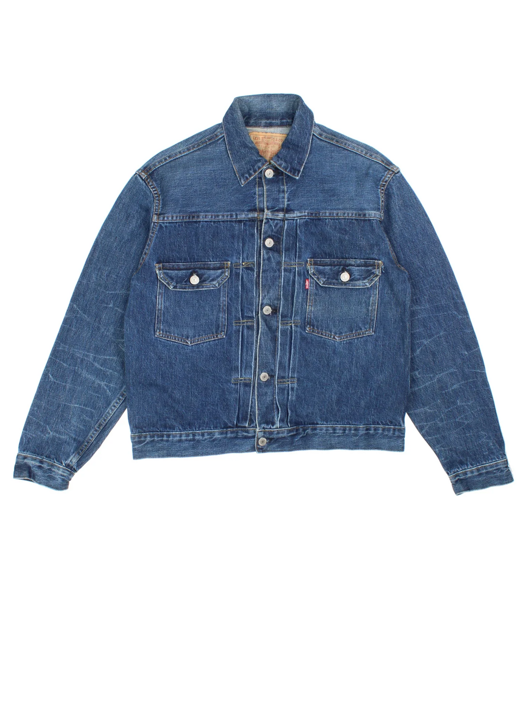 Vintage Levi Strauss 507 Denim Trucker Jacket in a blue colourway. Buttons up and has double chest pockets, and the logo tab embroidered on the front.