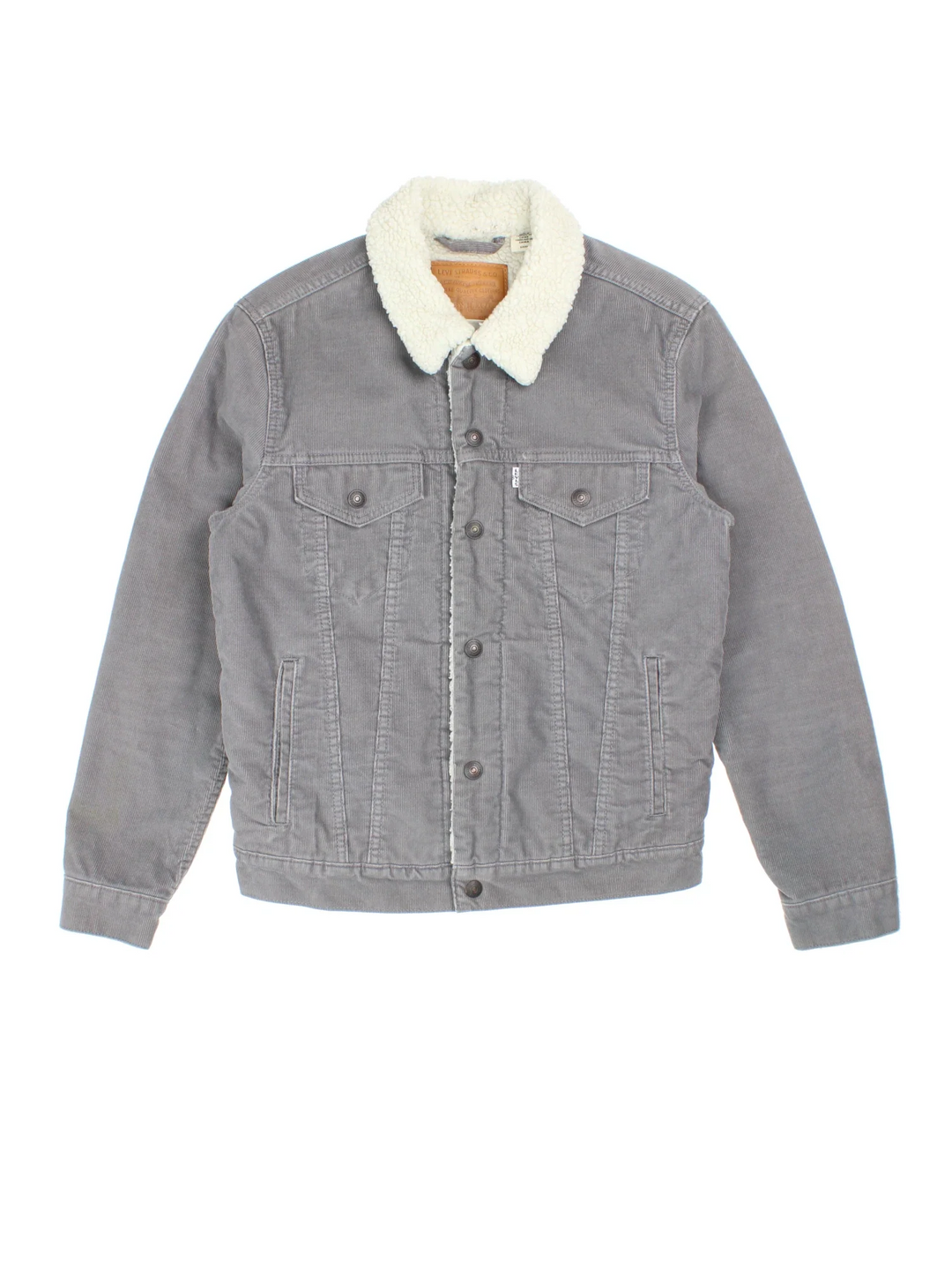 Levi Strauss Sherpa Cord Trucker Jacket in a grey colourway. Buttons up and has multiple pockets, insulated lining, and has the logo tab embroidered on the front.