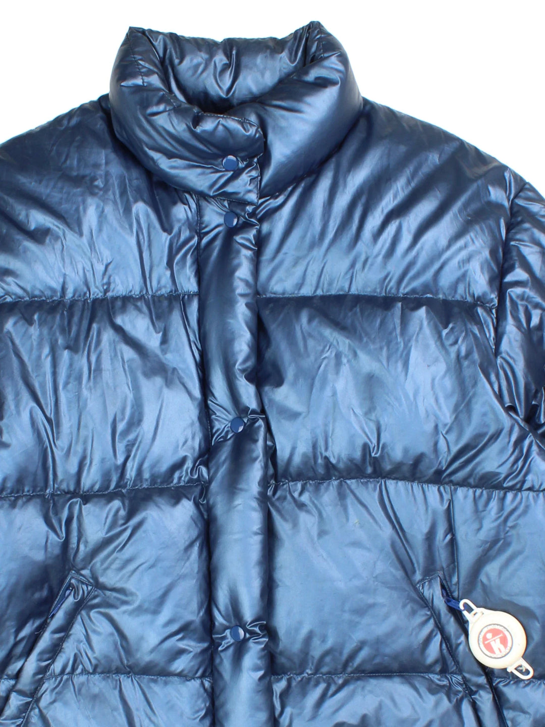Vintage Sergio Tacchini Down Puffer Jacket in a blue colourway. Zip/buttons up and has side pockets and down isulated.