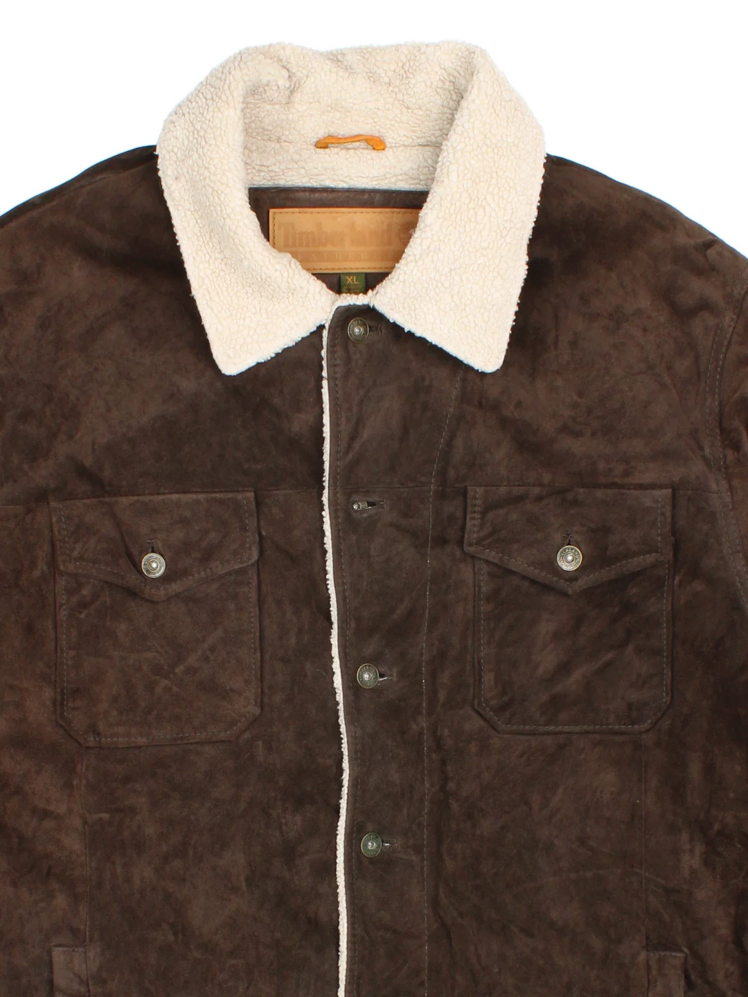 Timberland Shearling Trucker Jacket in a brown colourway. Button fastening, with multiple pockets and shearling lining.