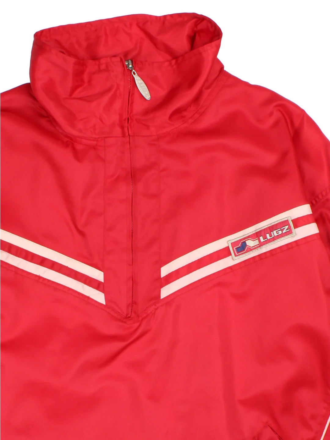 Vintage Lugz Shell Suit Jacket & Pants Set in a red colourway. Jacket has half zip up closure, side pockets, and the logo embroidered on the front and larger on the back. Pants have an elasticated waist with drawstring, pockets, mesh lining and the logo embroidered on the front and back