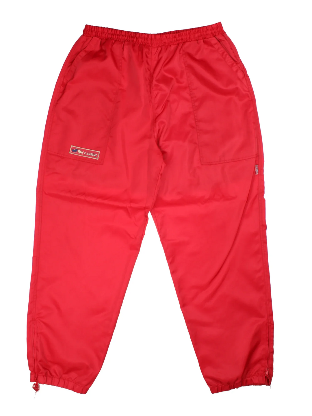 Vintage Lugz Shell Suit Jacket & Pants Set in a red colourway. Jacket has half zip up closure, side pockets, and the logo embroidered on the front and larger on the back. Pants have an elasticated waist with drawstring, pockets, mesh lining and the logo embroidered on the front and back