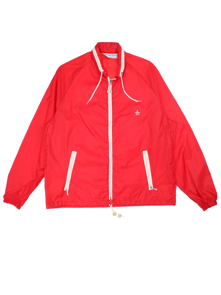 Vintage 60's Munsingwear Original Penguin Nylon Jacket in a red colourway. Zip up closure, has side pockets, hidden hood, and has the logo embroidered on the front.
