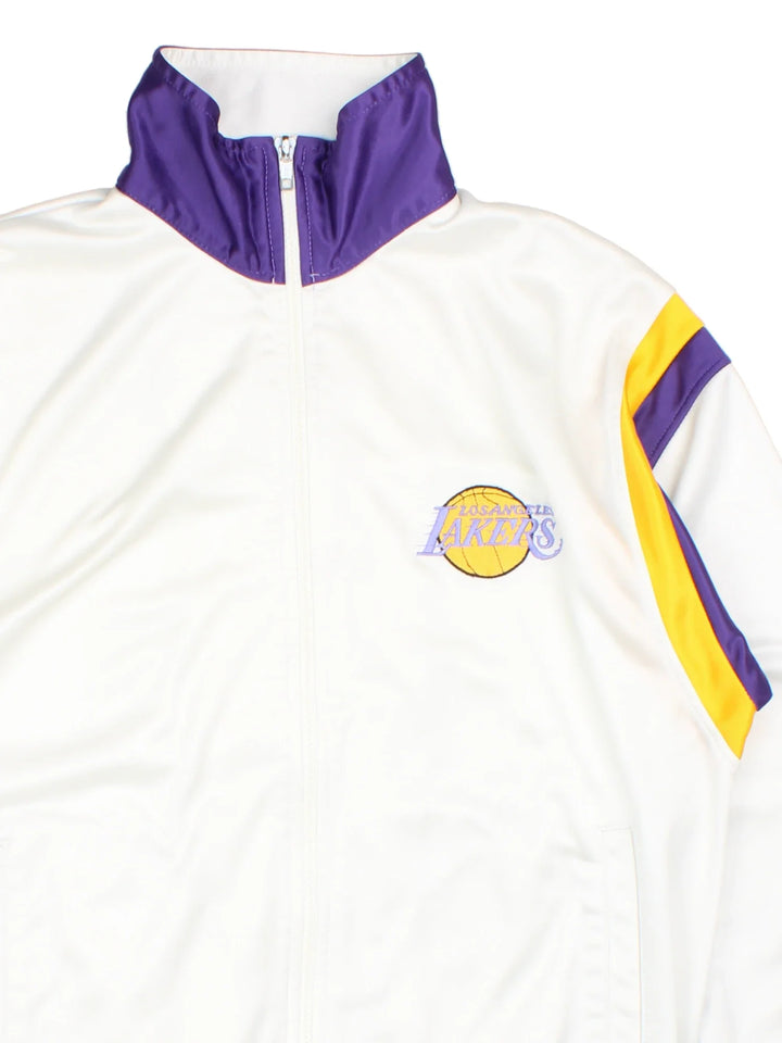 90's Los Angeles Lakers Starter Tracksuit Jacket in a white colourway with yellow and purple team colour detailing. Zip up closure, has side pockets, and the logo embroidered on the front.
