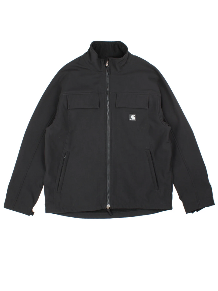 Carhartt Soft Shell Traditional Jacket in a black colourway. Zip up closure, has multiple pockets, and has logo embroidered on the front.