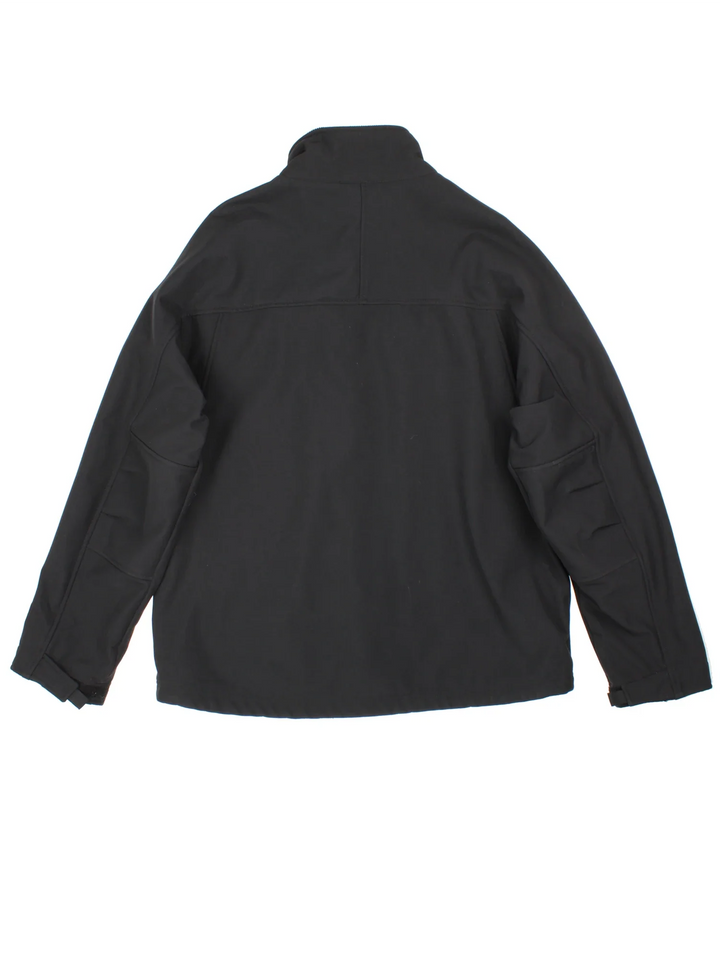 Carhartt Soft Shell Traditional Jacket in a black colourway. Zip up closure, has multiple pockets, and has logo embroidered on the front.