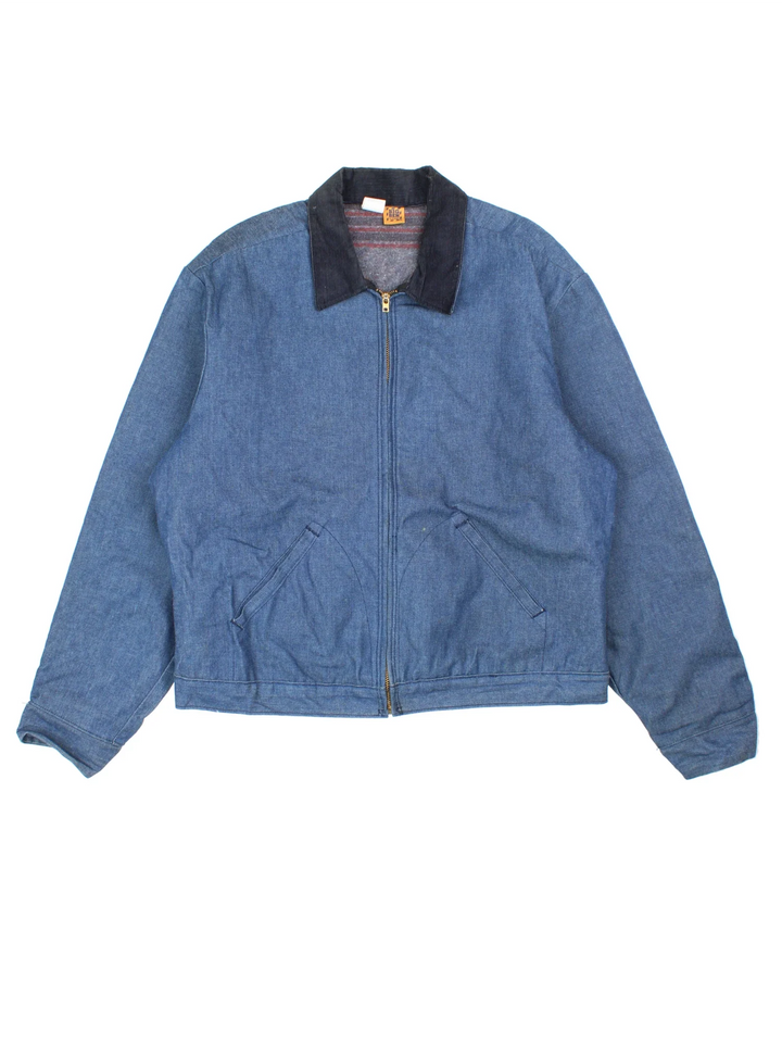 Vintage 80's Wrangler Big Ben Work Jacket in a blue colourway with a black corduroy collar. Zip up closure, has side pockets, blanket lining, and has 'Public Works Centre' spell out printed on the back.