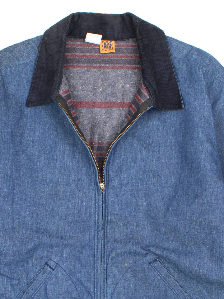 Vintage 80's Wrangler Big Ben Work Jacket in a blue colourway with a black corduroy collar. Zip up closure, has side pockets, blanket lining, and has 'Public Works Centre' spell out printed on the back.