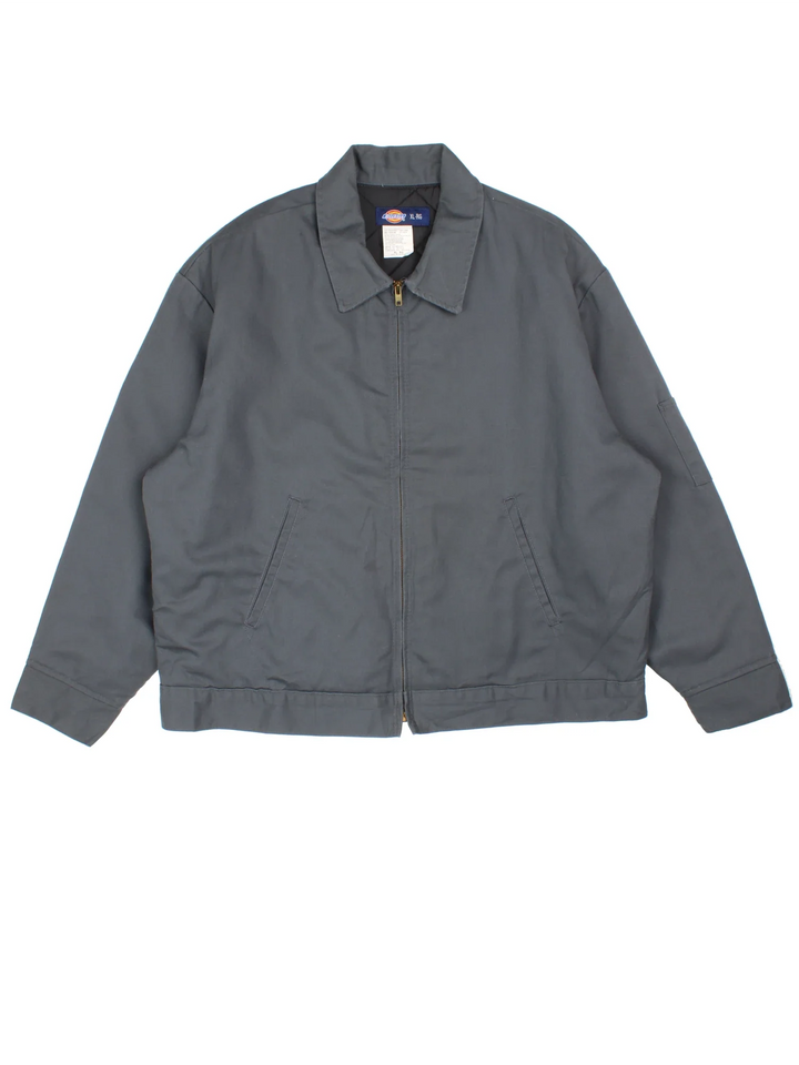 Dickies Eisenhower Jacket in a grey colourway. Zip up closure, has side pockets, and insulated with a quilted lining.