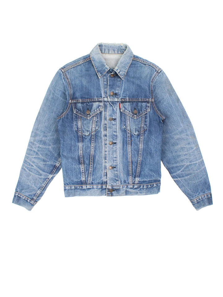 Vintage Levi Strauss Denim Jacket in a blue colourway. Buttons up and has double chest pockets, and the logo tab embroidered on the front.