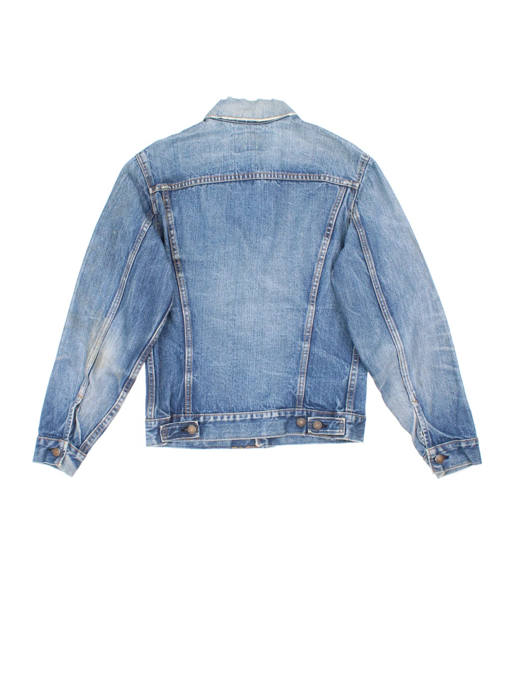 Vintage Levi Strauss Denim Jacket in a blue colourway. Buttons up and has double chest pockets, and the logo tab embroidered on the front.