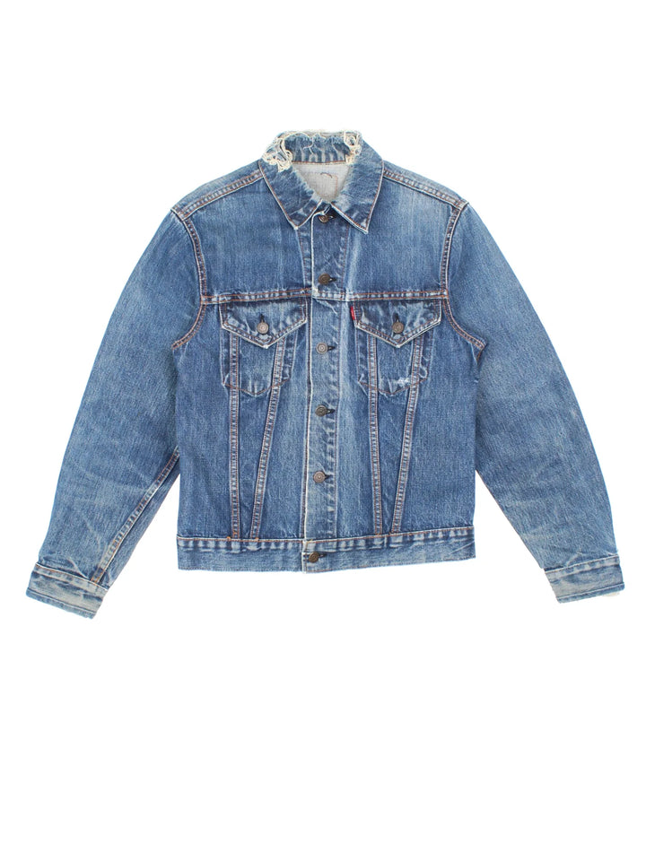 Vintage Levi Strauss Denim Jacket in a blue colourway. Buttons up and has double chest pockets, and the logo tab embroidered on the front.