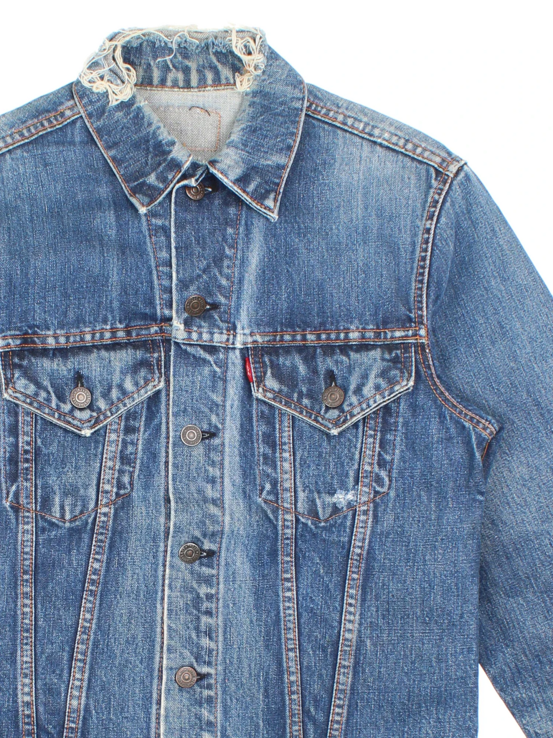 Vintage Levi Strauss Denim Jacket in a blue colourway. Buttons up and has double chest pockets, and the logo tab embroidered on the front.