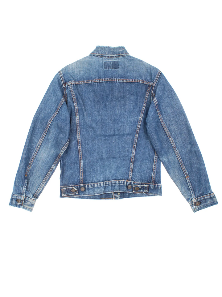 Vintage Levi Strauss Denim Jacket in a blue colourway. Buttons up and has double chest pockets, and the logo tab embroidered on the front.