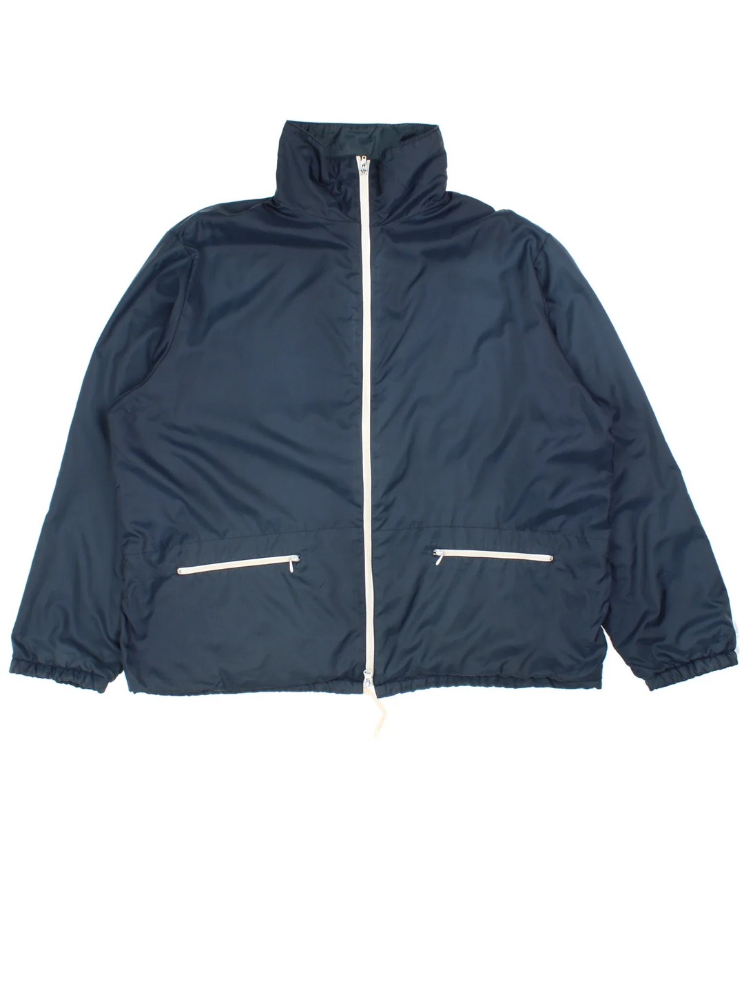 Vintage Woolrich Windbreaker Jacket in a navy blue colourway. Zips up and has side pockets, and a big collar.