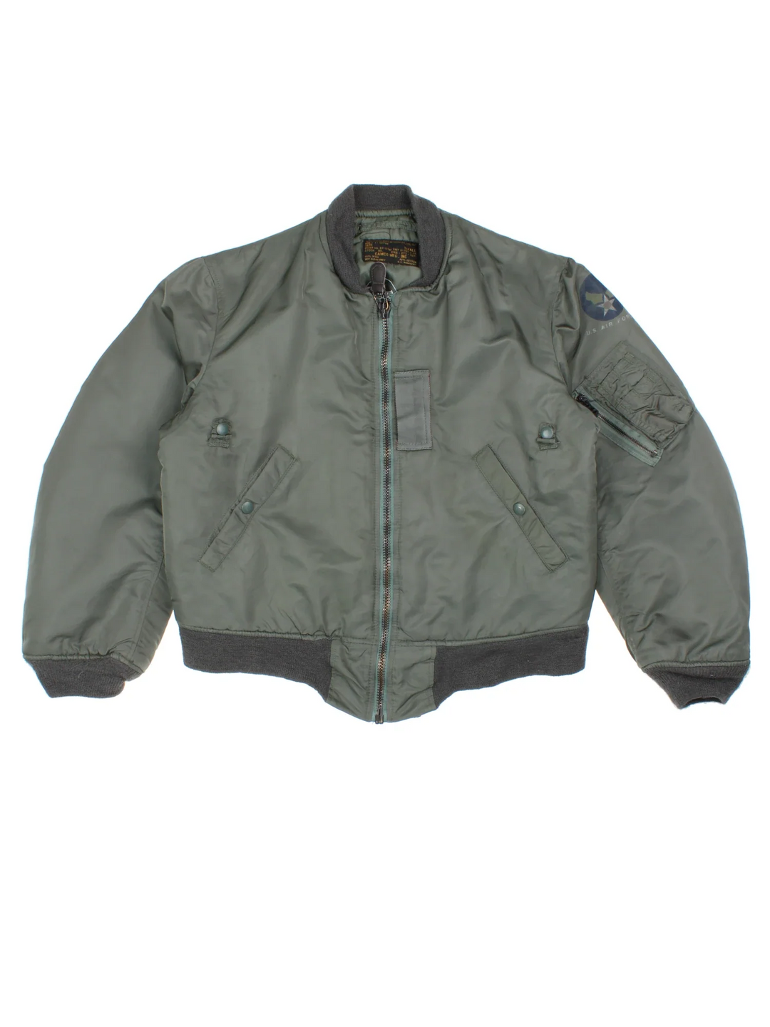 Vintage MA-1 Flight Bomber Jacket in a green colourway. Zips up and has multiple pockets, and the logo printed on the left sleeve.
