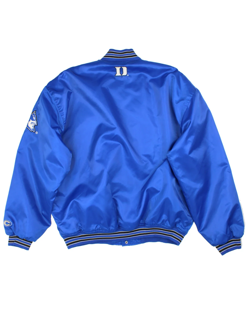 Vintage 90's Duke Blue Devils Varsity Jacket in a blue colourway. Buttons up and has side pockets, insulated lining, and the team spell out embroidered on the front and logo on the left sleeve.