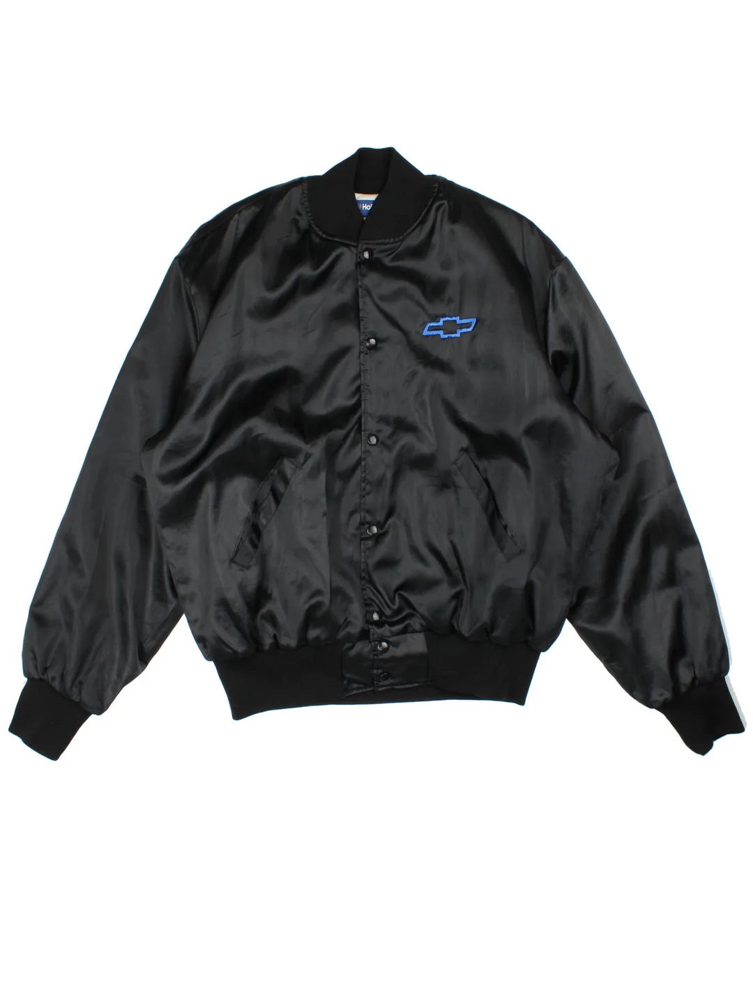 Vintage 90's Chevrolet Varsity Jacket in a black colourway. Zips up and has side pockets, and the logo embroidered on the front/back.