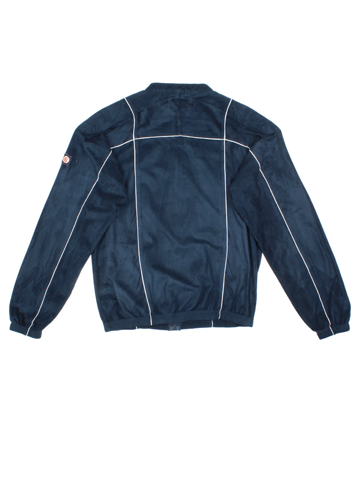Vintage Fila Velour Track Top in a blue colourway. Zips up and has side pockets, contrast piping and logo embroidered on the sleeve