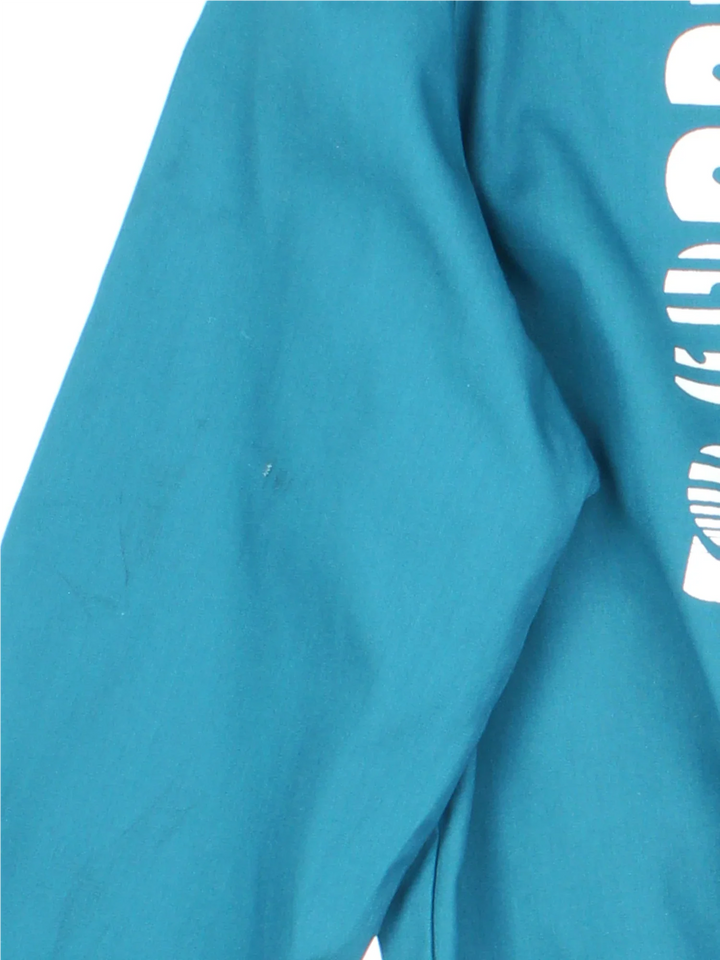 Vintage The Stompers Harrington Jacket in a blue colourway. Zips up and has side pockets, elasticated collar/cuffs and printed spell out / graphic on the front and back