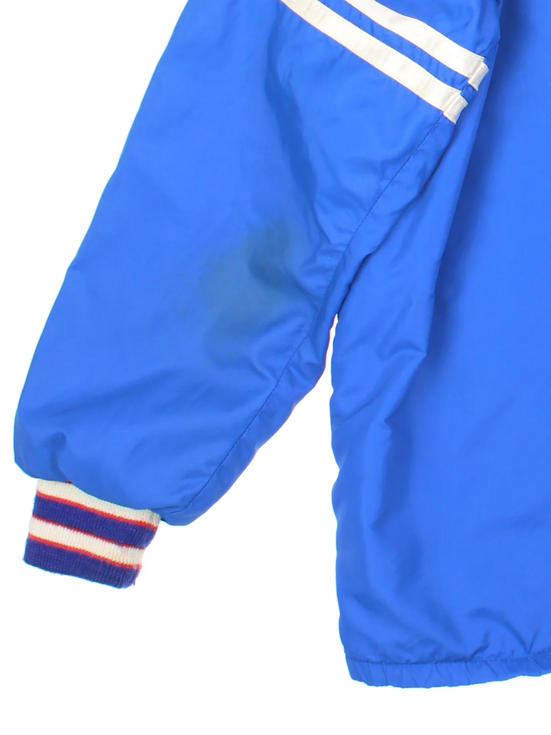 Vintage 1958 Grand Ledge Varsity Jacket in a blue colourway. Popper fastening and has side pockets, elasticated collar/cuffs and embroidered detail on the front/sleeve.