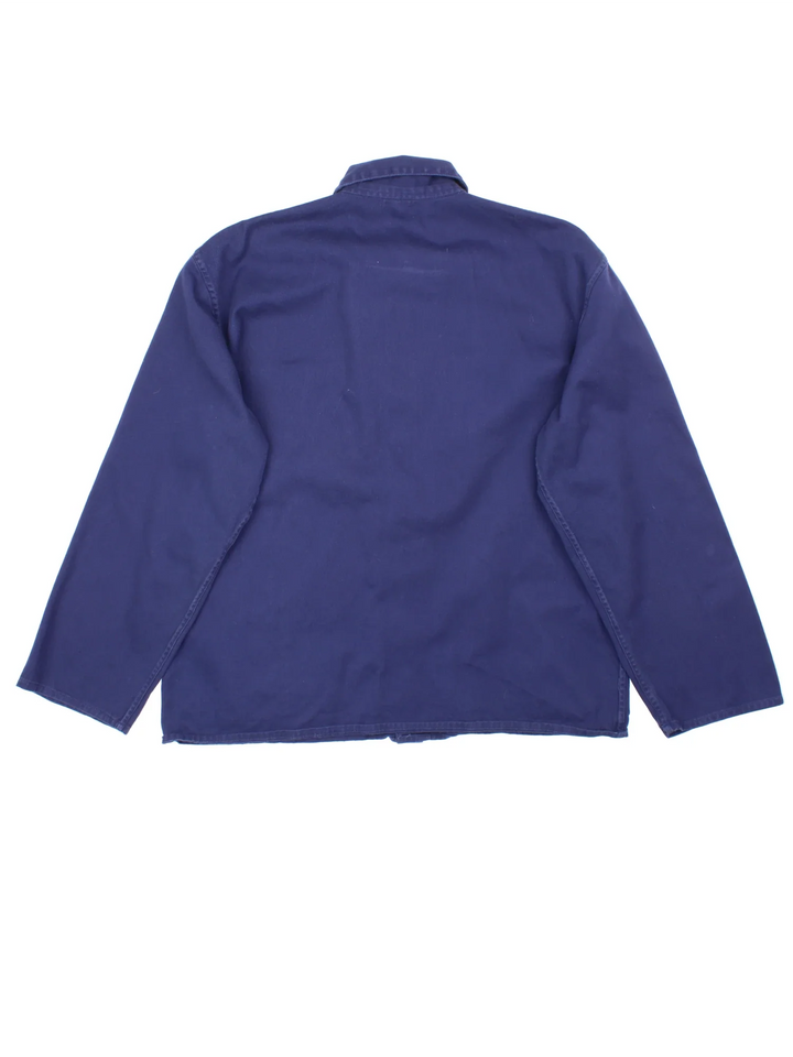 Vintage French Work Chore Jacket in a blue colourway. Button fastening and has front pockets.