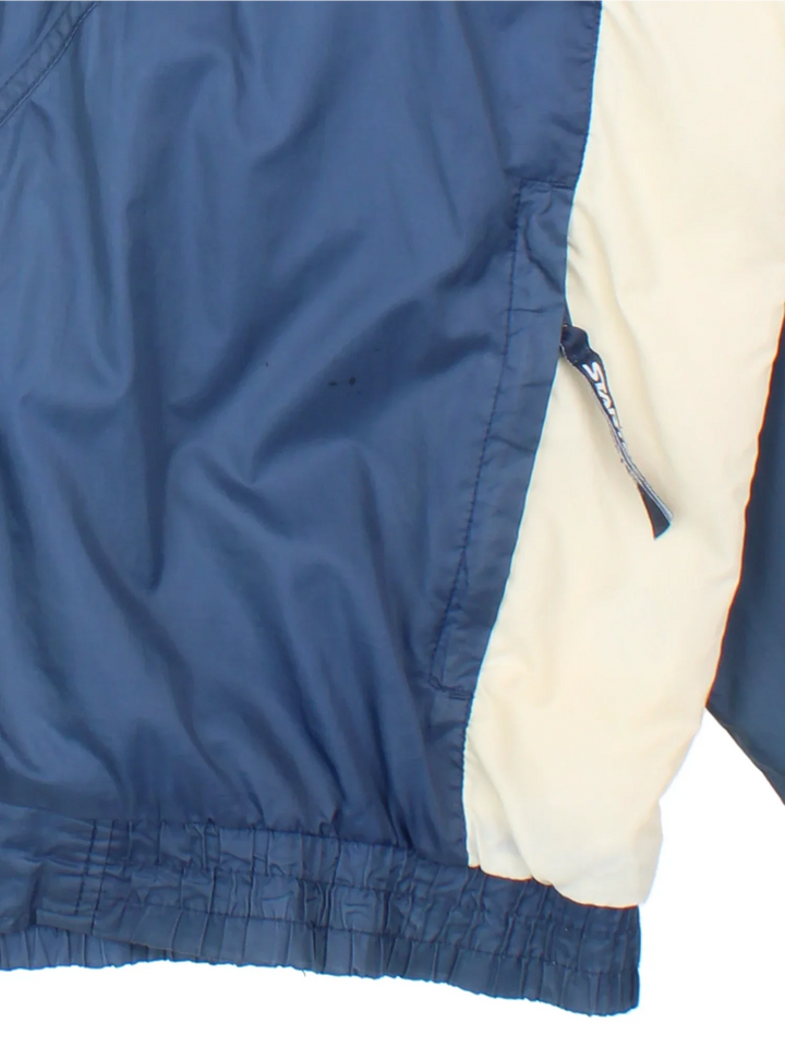 90's Starter Notre Dame Windbreaker Jacket in a blue, yellow and white colourway. Zips up and has side pockets, and has the logo embroidered on the front and spell out on the back.